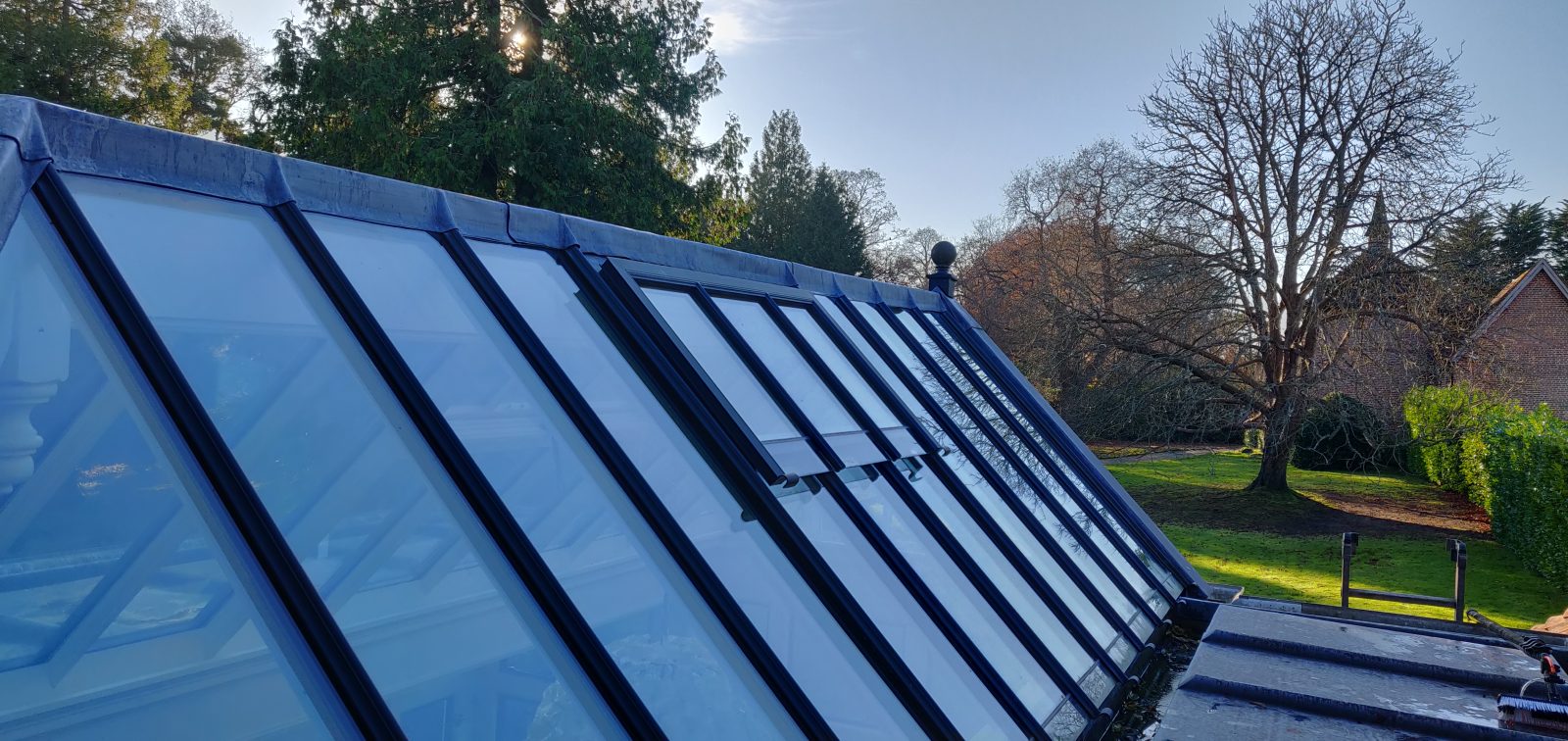 Orangery glass roof cleaned near Forest Row, East Sussex, gutters cleared