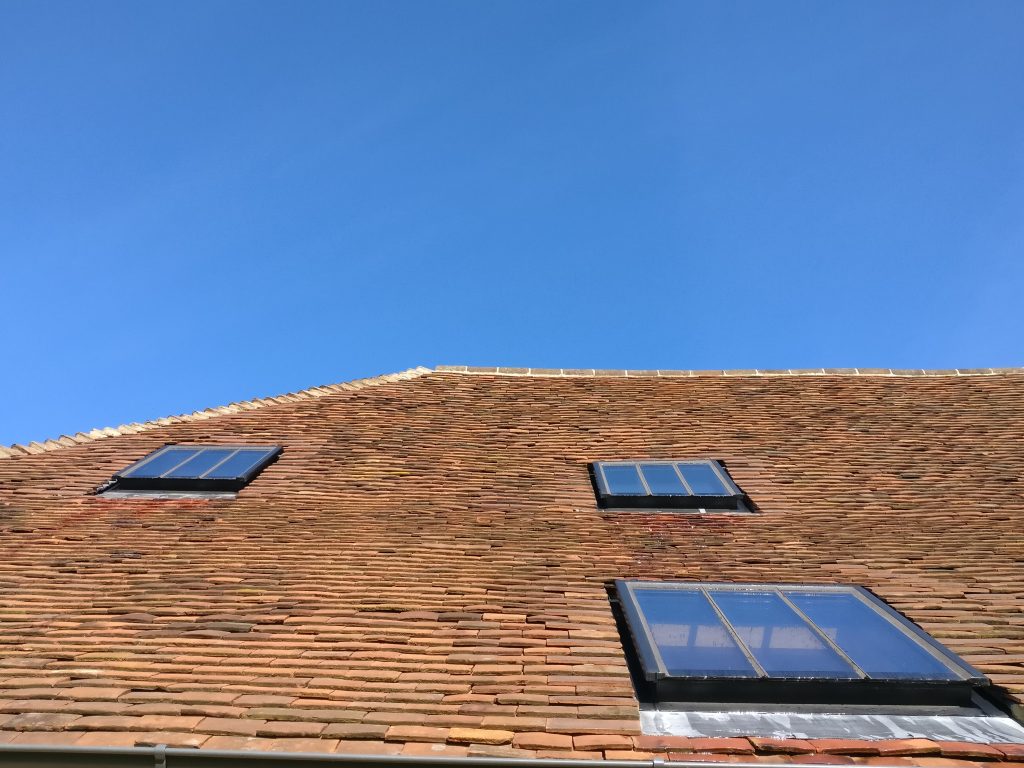 Cleaning windows and skylights at a historic home near Heathfield