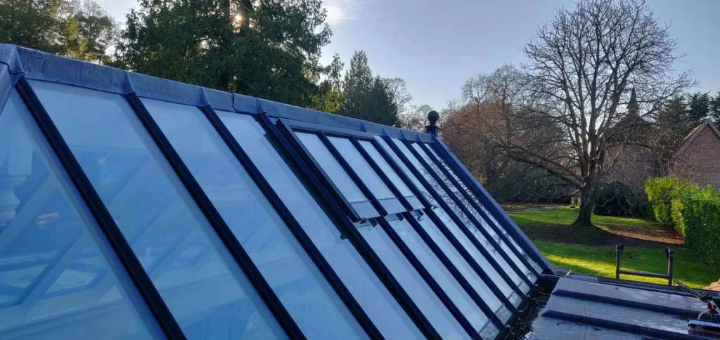 Orangery glass roof cleaned near Forest Row, East Sussex, gutters cleared