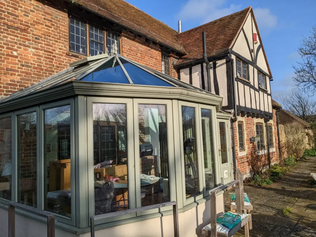 Leaded windows and a glazed orangery at a rural property near Brightling
