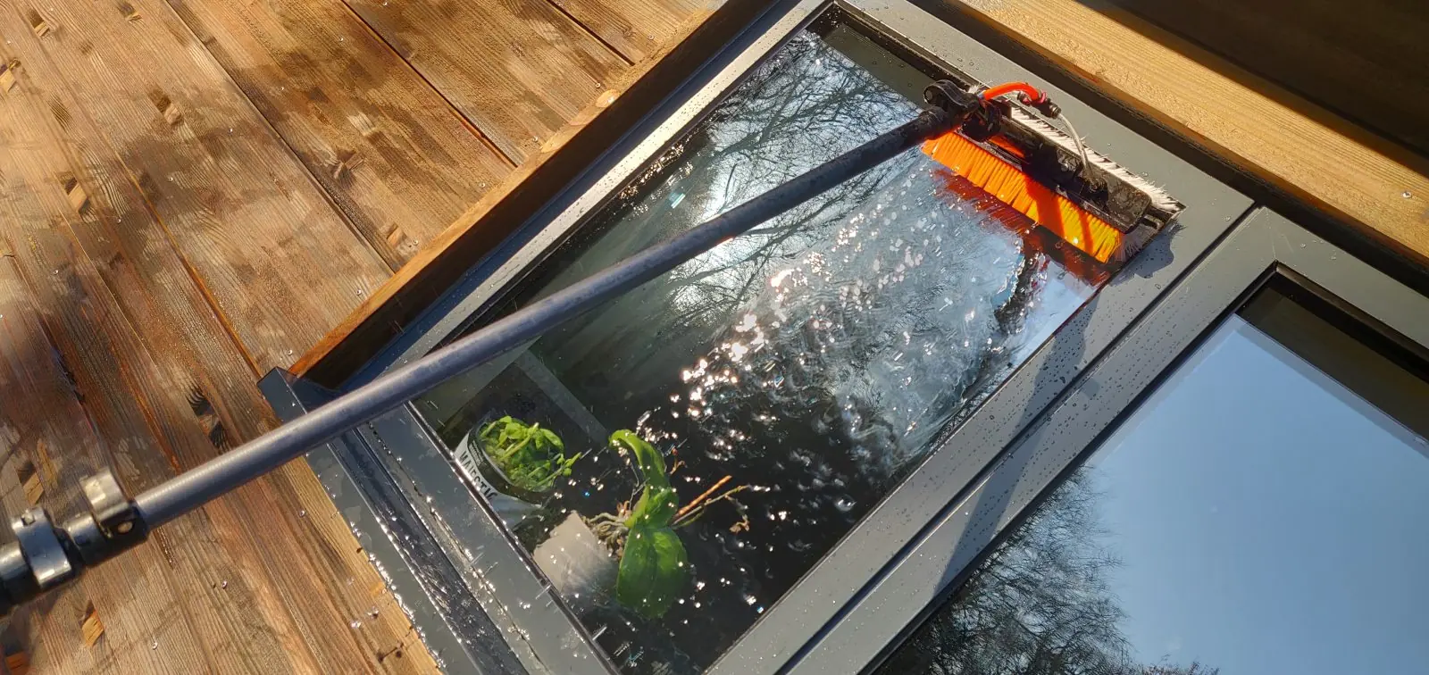 Careful window cleaning at a rural property in Piltdown near Maresfield