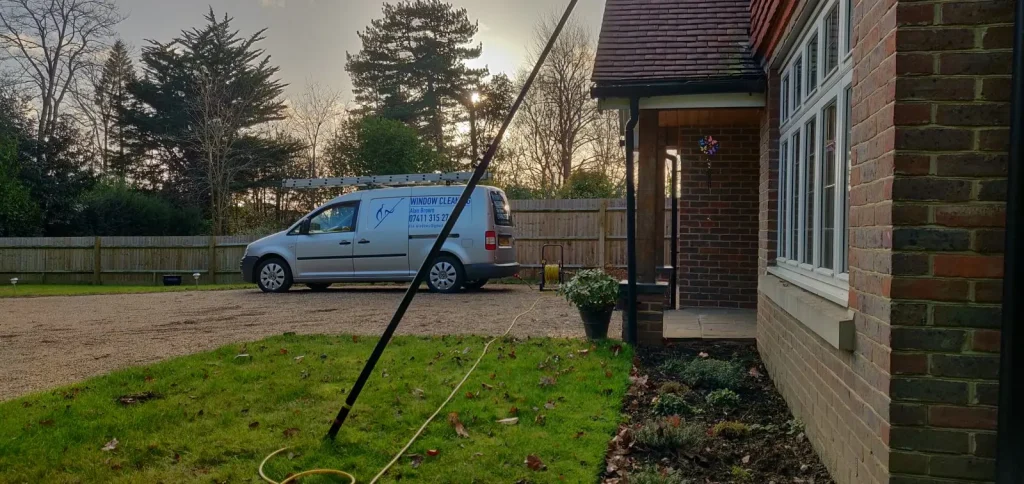 Window cleaning at a home near Mark Cross in winter